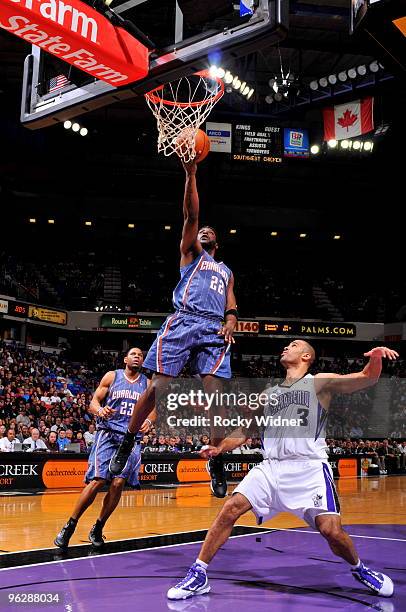 Ronald Murray of the Charlotte Bobcats gets to the basket against Ime Udoka of the Sacramento Kings on January 30, 2010 at ARCO Arena in Sacramento,...