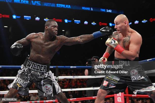 Deontay Wilder throws a left hand against Artur Szpilka at the Barclays Center in the Brooklyn borough of New York City on January 16, 2016. Wilder...