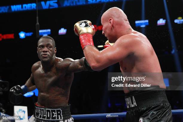 Deontay Wilder lands a left hand against Artur Szpilka at the Barclays Center in the Brooklyn borough of New York City on January 16, 2016. Wilder...