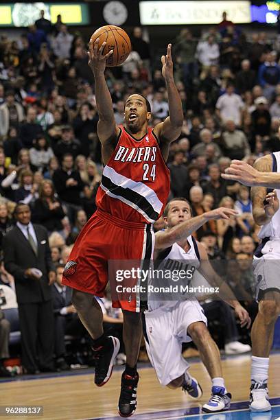 Guard Andre Miller of the Portland Trail Blazers takes a shot against Jose Juan Barea of the Dallas Mavericks on January 30, 2010 at American...
