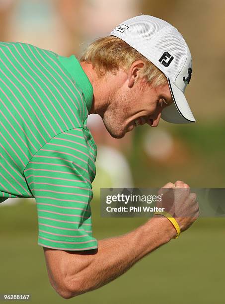 Andrew Dodt of Australia celebrates sinking his putt on the 18th green during day four of the New Zealand Open at The Hills Golf Club on January 31,...