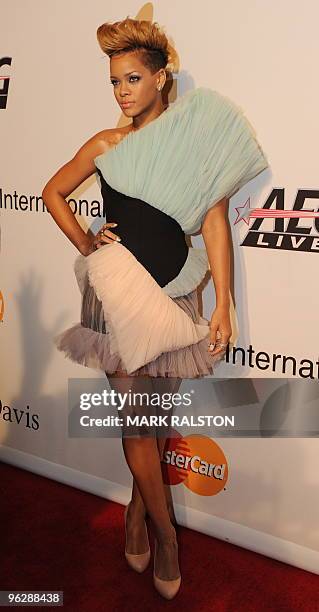 Singer Rihanna arrives on the red carpet during the Pre-Grammy Gala at the Beverly Hilton Hotel in Beverly Hills on January 30, 2010. The...