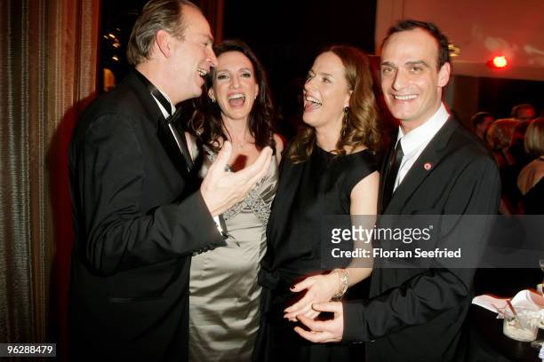 Herbert Knaup and wife Christiane and Anatol Taubmann and Claudia Michelsen attend the Goldene Kamera 2010 Award at the Axel Springer Verlag on...