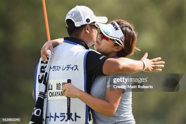 Eri Okayama of Japan hugs her caddie after winning the Resorttust Ladies at Kansai Golf Club on May 27, 2018 in Miki, Hyogo, Japan.