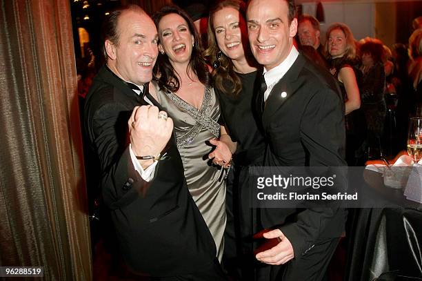 Herbert Knaup and wife Christiane and Anatol Taubmann and Claudia Michelsen attend the Goldene Kamera 2010 Award at the Axel Springer Verlag on...