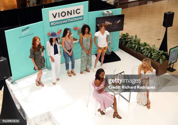 Alexis Bennett, Ecommerce Editor for InStyle, and host Kathryn Dunn participate in the InStyle xVionic Secrets to Spring Style event at Dillard's...