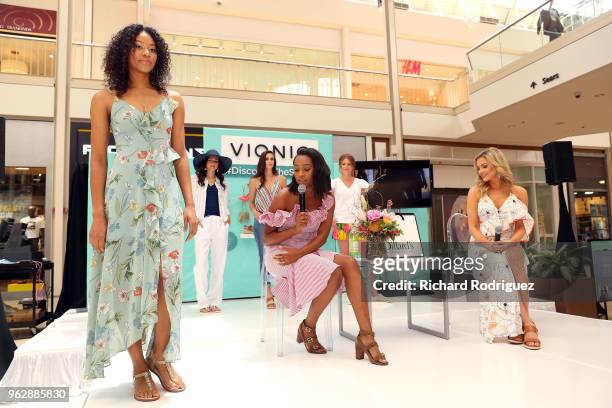 Alexis Bennett, Ecommerce Editor for InStyle, and host Kathryn Dunn participate in the InStyle xVionic Secrets to Spring Style event at Dillard's...