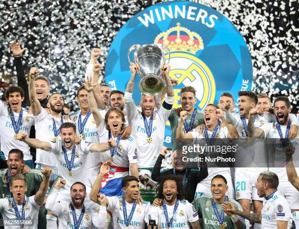 Sergio Ramos of Real Madrid lifts the trophy during the UEFA Champions League final between Real Madrid and Liverpool on May 26, 2018 in Kiev,...