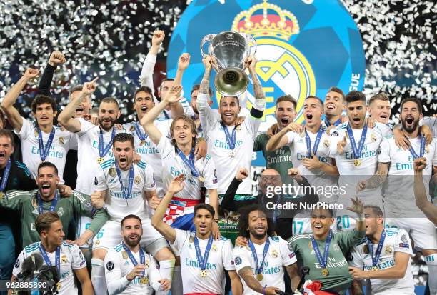 Sergio Ramos of Real Madrid lifts the trophy during the UEFA Champions League final between Real Madrid and Liverpool on May 26, 2018 in Kiev,...