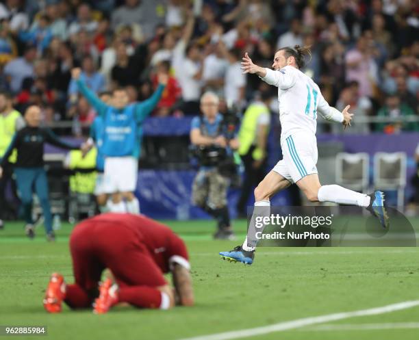 Gareth Bale of Real Madrid celebrates scoring his side's first goal during the UEFA Champions League Final between Real Madrid and Liverpool at NSC...