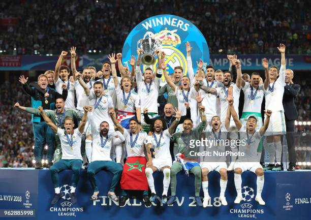 Real Madrid players celebrate after they won UEFA Champions League Final match against Liverpool FC at NSC Olipiyskyi stadium in Kyiv, Ukraine, May...