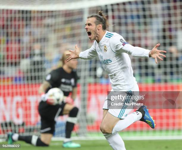 Gareth Bale of Real Madrid celebrates scoring his side's second goal during the UEFA Champions League Final between Real Madrid and Liverpool at NSC...