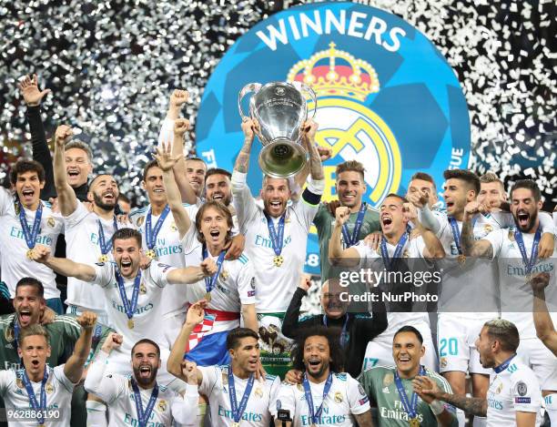 Sergio Ramos of Real Madrid lifts the trophy during the UEFA Champions League final between Real Madrid and Liverpool on May 26, 2018 in Kiev,...