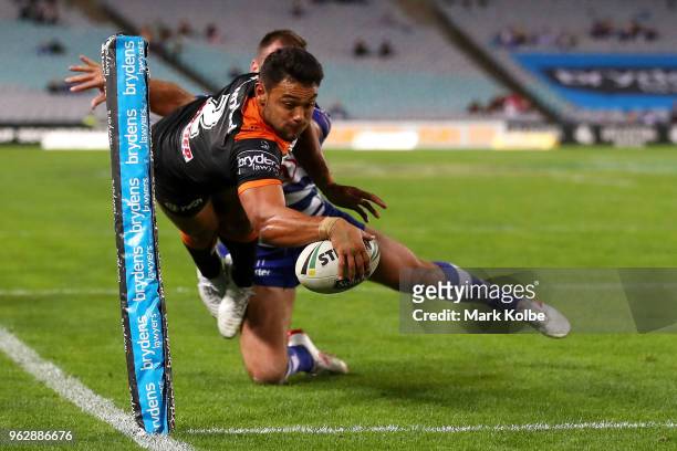 David Nofoaluma of the Tigers scores a try in the corner during the round 12 NRL match between the Wests Tigers and the Canterbury Bulldogs at ANZ...