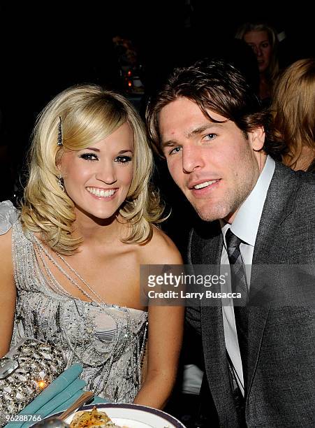 Singer Carrie Underwood and professional hockey player Mike Fisher during the 52nd Annual GRAMMY Awards - Salute To Icons Honoring Doug Morris held...