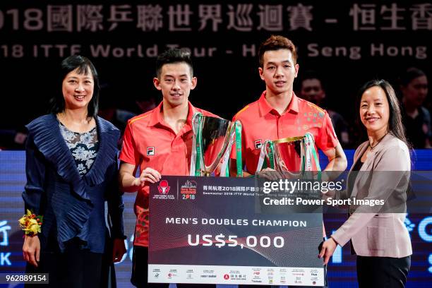 Ho Kwan Kit and Wong Chun Ting of Hong Kong pose with their prize after winning the men's doubles - final match against Masataka Morizono and Yuya...