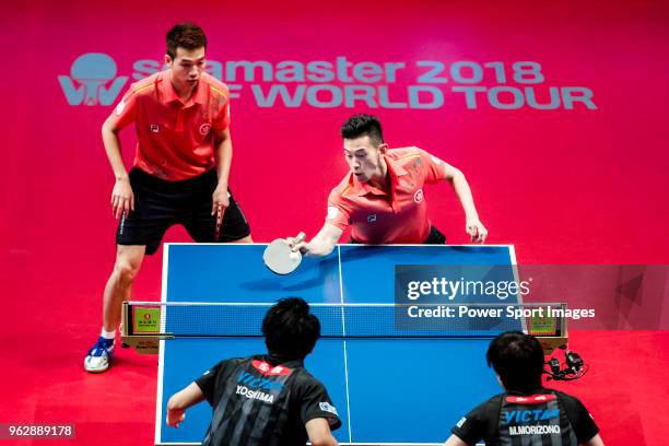 Ho Kwan Kit and Wong Chun Ting of Hong Kong competes against Masataka Morizono and Yuya Oshima of Japan during the men's doubles - final match of...