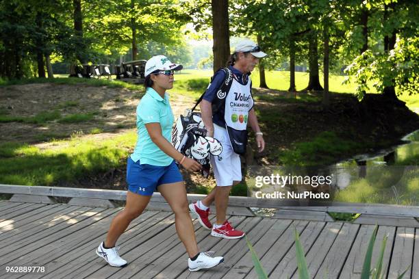 Nasa Hataoka of Japan and caddy crosses the footbridge on her way to the 7th hole during the third round of the LPGA Volvik Championship at Travis...