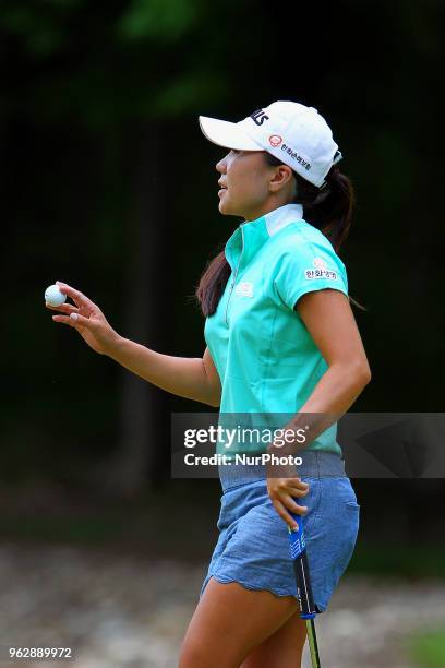In-Kyung Kim of Seoul, Republic of Korea greets the fans after making her putt on the 4th green during the third round of the LPGA Volvik...