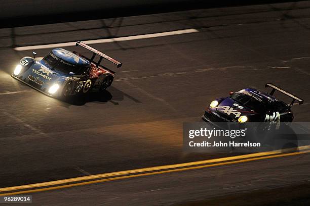 The TELEMEX/Target BMW/Riley driven by Scott Pruett, Memo Rojas, Justin Wilson & Max Papis race with the AXA Porsche GT3 Cup driven by drivers Ted...