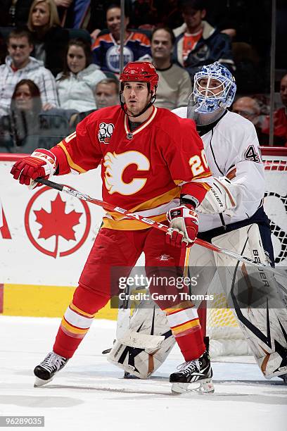 Curtis Glencross of the Calgary Flames skates against Devan Dubnyk of the Edmonton Oilers on January 30, 2010 at Pengrowth Saddledome in Calgary,...