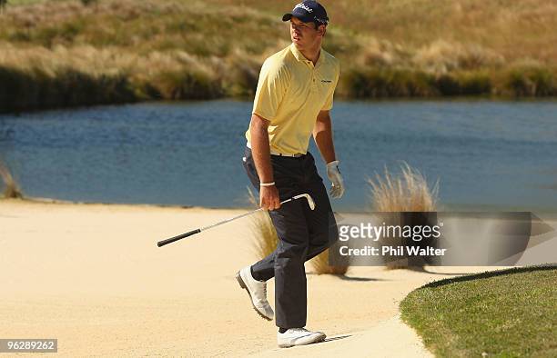 Robert Gates of the USA walks out of the sand on the 17th hole during day four of the New Zealand Open at The Hills Golf Club on January 31, 2010 in...