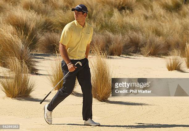 Robert Gates of the USA walks out of the sand on the 17th hole during day four of the New Zealand Open at The Hills Golf Club on January 31, 2010 in...