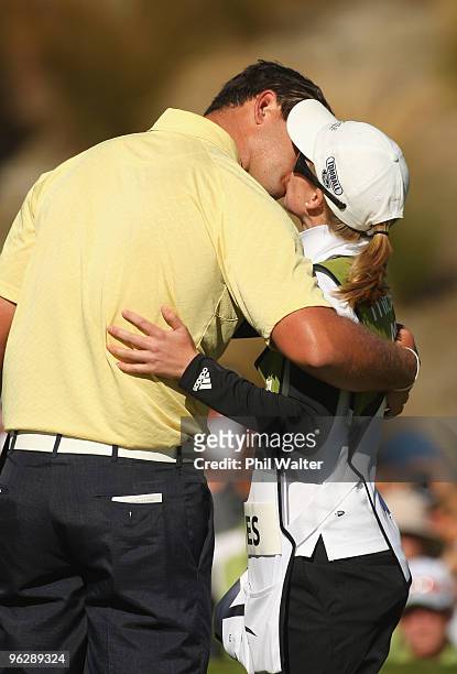 Robert Gates of the USA kisses his caddy and girlfriend Lauren Johnson following his win on day four of the New Zealand Open at The Hills Golf Club...