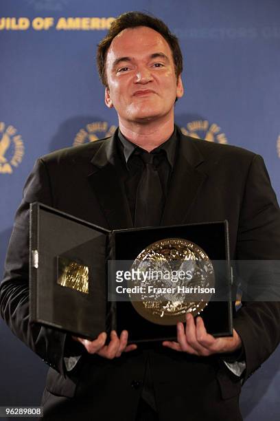 Director Quentin Tarantino poses with his Feature Film Nomination Plaque for "Inglourious Basterds" in the press room during the 62nd Annual...
