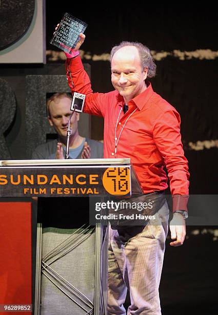 Director Christian Frei accepts the World Cinema Directing Award for Documentary for "Space Tourists" onstage at the Awards Night Ceremony during the...