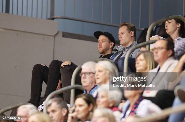 Joe Ingles watches the round five Super Netball match between the Giants and the Vixens at Quay Centre on May 27, 2018 in Sydney, Australia.
