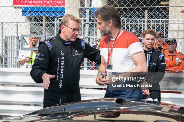 Mika Hakkinen and actor Nikolaj Coster-Waldau is seen during the Monaco Formula One Grand Prix at Circuit de Monaco on May 27, 2018 in Monte-Carlo,...