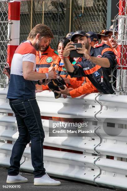 Actor Nikolaj Coster-Waldau signs autographs as he is seen during the Monaco Formula One Grand Prix at Circuit de Monaco on May 27, 2018 in...