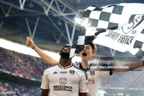 Aboubakar Kamara of Fulham celebrates with a fan during the Sky Bet Championship Play Off Final between Aston Villa and Fulham at Wembley Stadium on...