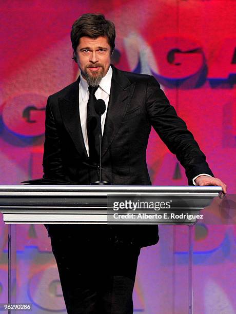 Actor Brad Pitt presents the Feature Film Nomination Plaque to Director Quentin Tarantino for 'Inglourious Basterds' onstage during the 62nd Annual...