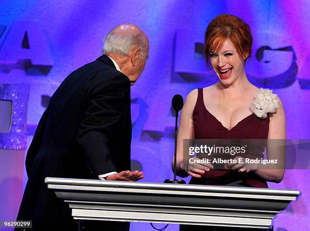 Host Carl Reiner and actress Christina Hendricks present the Comedy Series award onstage during the 62nd Annual Directors Guild Of America Awards at...