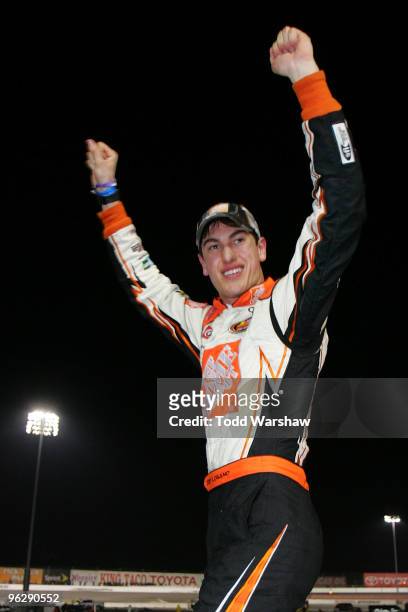 Joey Logano, driver of the Home Depot Toyota, celebrates after winning the NASCAR Toyota All Star Showdown at Toyota Speedway At Irwindale on...