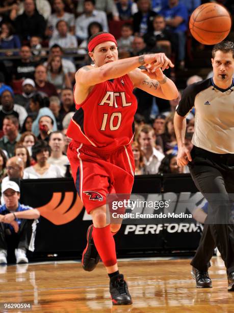 Mike Bibby of the Atlanta Hawks passes the ball up the court against the Orlando Magic during the game on January 30, 2010 at Amway Arena in Orlando,...