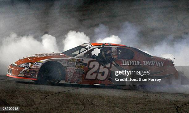 Joey Logano driver of the Hoe Depot Toyota celebrates his win during the NASCAR Toyota All-Star Showdow at Toyota Speedway on January 30, 2010 in...