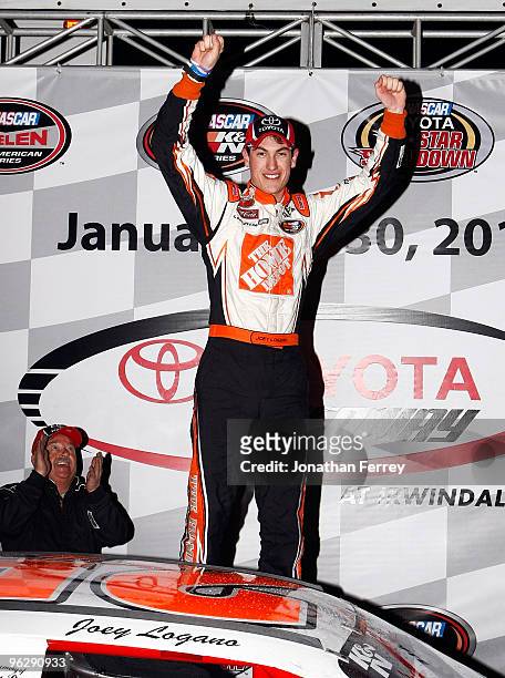 Joey Logano driver of the Hoe Depot Toyota celebrates his win during the NASCAR Toyota All-Star Showdow at Toyota Speedway on January 30, 2010 in...