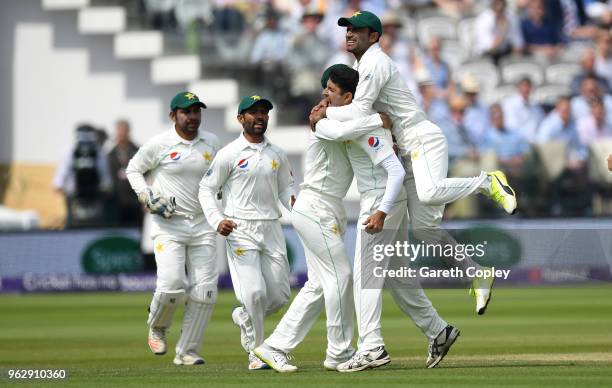 Mohammad Abbas of Pakistan celebrates dismissing Jos Buttler of England during day four of the 1st NatWest Test match at Lord's Cricket Ground on May...
