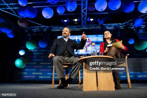 Ehud Barak, former Prime Minister of Israel, talks with Bronwen Maddox at the Hay Festival on May 27, 2018 in Hay-on-Wye, Wales.