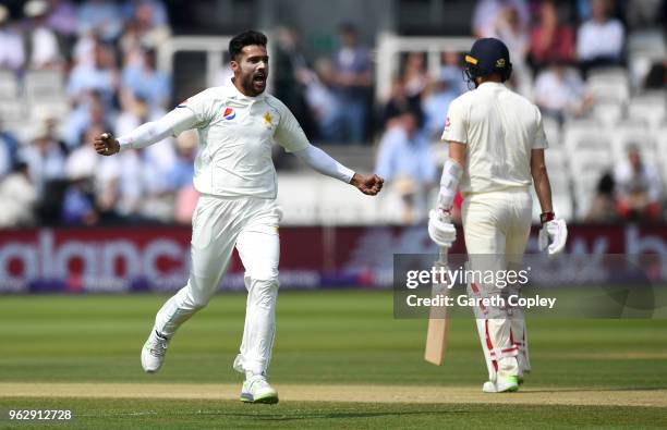 Mohammad Amir of Pakistan celebrates dismissing Mark Wood of England during day four of the 1st NatWest Test match at Lord's Cricket Ground on May...