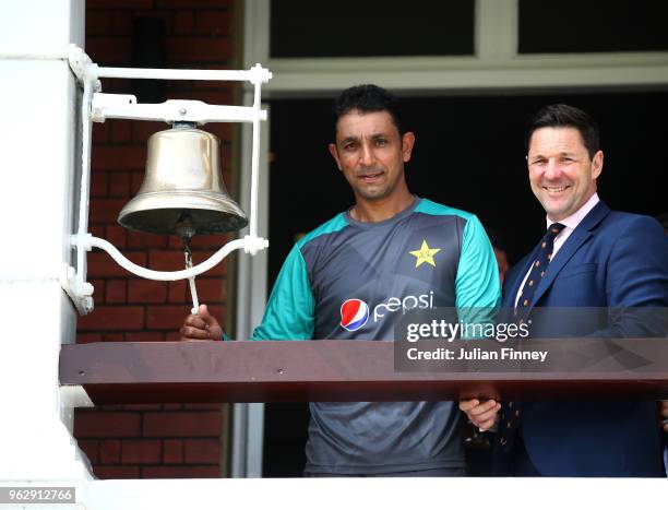 Azhar Mahmood of Pakistan rings the bell prior to day four of the 1st Test match between England and Pakistan at Lord's Cricket Ground on May 27,...