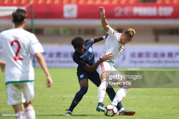 Norman Timari of Hungary and Jonathan Panzo of England vie for the ball during the 2018 Panda Cup International Youth Football Tournament between...