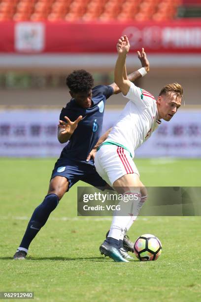 Norman Timari of Hungary and Jonathan Panzo of England vie for the ball during the 2018 Panda Cup International Youth Football Tournament between...