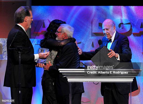 President Taylor Hackford, singer Cher, Director Norman Jewison, recipient of the Lifetime Achievement Award and host Carl Reiner speak onstage...