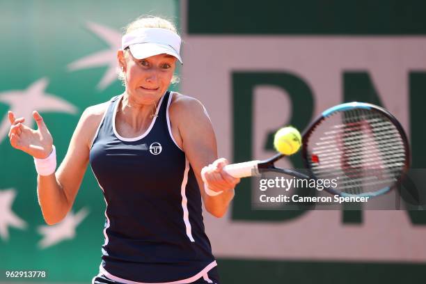 Ekaterina Makarova of Russia plays a forehand during her first round women's singles match against Saisai Zheng of China on day one of the French...