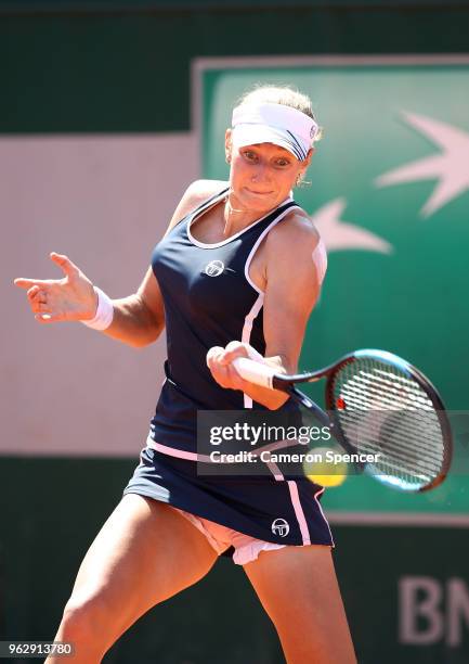 Ekaterina Makarova of Russia plays a forehand during her first round women's singles match against Saisai Zheng of China on day one of the French...