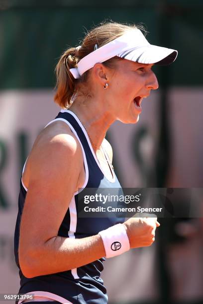 Ekaterina Makarova of Russia celebrates a point during her first round women's singles match against Saisai Zheng of China on day one of the French...